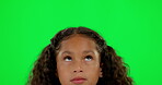 Thinking, face and girl on green screen with confused, eyes or question or doubt on studio background. Child, kid and student with idea, decision or daydreaming emoji or frustrated choice or eye roll