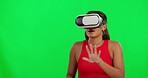 Woman, green screen and vr glasses in studio with search, metaverse gaming and hand gesture for mockup. Girl, model or cyber gamer with augmented reality tech for 3d video, user experience and moving