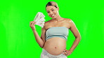 Pregnant woman, money fan and financial freedom on green screen against a studio background. Portrait of happy female person in maternity with smile for cash, loan or savings investment on mockup