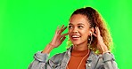 Happy woman, dancing and listening to music on green screen against a studio background. Female person with earphones enjoying audio, streaming or sound track in dance for fun time on mockup space