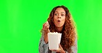 Excited woman, popcorn and green screen eating movie snack and watching tv. Young, female person and smile streaming series or in theater at cinema with food and happy from film and television