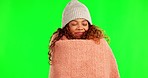 Blanket, warm and face of a woman on a green screen isolated on a background in a studio. Happy, comfy and portrait of a young girl with warmth and happiness from a duvet for comfort in winter