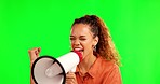 Happy woman, megaphone and shouting on green screen for winning or announcement against a studio background. Excited female person screaming or yelling for win, victory or success on chromakey mockup