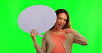 Happy woman, face and pointing to speech bubble on green screen for social media or advertising. Portrait of female person point to shape, symbol or icon for advertisement or news on mockup space