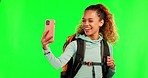 Green screen phone, hiking selfie or happy woman trekking, backpacking and travel for photography. Social network app, chroma key cellphone or fitness person post memory picture on studio background 