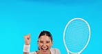 Face, tennis and woman cheering, happy and winner against a blue studio background. Portrait, female person and player with a racket, champion and achievement with goals, winning and celebration 