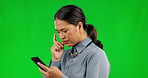 Thinking, phone and woman on green screen typing an idea, question or confused on social media, web or mobile app. Person, smartphone and search online for information, technology and communication