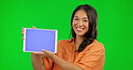 Asian woman, tablet and mockup on green screen for social media or advertising against a studio background. Portrait of happy female person showing technology on mock up display and tracking markers