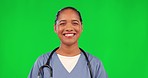 Woman, doctor and laugh by green screen, face or funny smile for healthcare, wellness and mockup. Young nurse, happy female medic and portrait in uniform, scrubs or pride for medical career at clinic