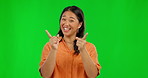 Asian woman, applause and pointing for good job on green screen in celebration against a studio background. Portrait of happy female person clapping for congratulations, success or winning on mockup