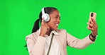 Video call, green screen and woman dance while streaming music in a studio, happy and celebrating on mockup background. Virtual, party and happy female dancing to live event, podcast or online radio