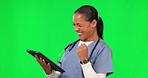 Healthcare, nurse and woman with a tablet on green screen to celebrate win or results. Happy female doctor with fist and digital tech in studio for research, consultation or review for medical care