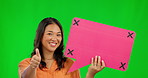 Happy asian woman, speech bubble and thumbs up on green screen for success against a studio background. Female person with smile and tracking markers for yes sign, like emoji or social media comment