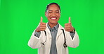Thumbs up, doctor and green screen for healthcare support, thank you or success and excellence in clinic services. Happy face of medical  latino woman for like, yes and okay hand on studio background