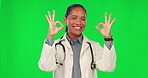 Okay sign, face and doctor on green screen for healthcare success, support or excellence in services. Happy medical worker or latino woman for agreement, good job or yes hands on a studio background