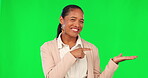 Woman, presentation and point at choice, green screen and business info and opportunity with smile on studio background. News, announcement and mockup space with female professional and advertising