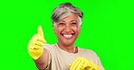 Thumbs up, green screen and face of woman for cleaning, housework and maid service. Advertising, housekeeping and portrait of senior female person with hand gesture for thank you, yes or approval