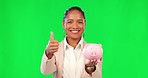 Piggy bank, woman and green screen, thumbs up and financial success for savings, finance security and cash. Save money, support and happy face of business person with like emoji on studio background