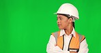 Woman in construction, direction and arms crossed on green screen, confidence and agreement on studio background. Mockup space, female contractor looking at choice and architecture with presentation
