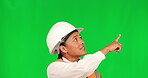 Woman, construction and pointing at list, green screen and advertising, architecture information and think on studio background. Female person, contractor and choice, mockup space and engineer ideas