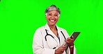 Digital tablet, woman and doctor in a studio with green screen doing medical research for diagnosis. Happy, smile and portrait of female healthcare worker with technology by a chroma key background.
