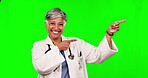 Green screen, senior woman face or happy doctor pointing at presentation, healthcare discount or medical insurance info. Chroma key portrait, clinic logo design or female surgeon on studio background