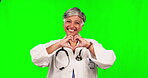 Doctor, heart and hands, old woman and green screen, healthcare support and cardiovascular surgeon on studio background. Mockup space, female medical staff and love with care in medicine and emoji