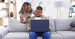 Home, laptop and couple with a credit card, finance and discussion for online shopping, payment and internet search. Man, woman and pc for transactions, budget planning and talking in a living room