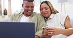 Laptop, phone and funny couple in home living room on sofa, bonding or having fun. Computer, relax and happy man and woman laughing at comedy, meme or streaming movie, video or social media together.