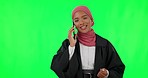 Muslim young woman, phone call and green screen with smile, listening and talking with contact in mock up. Happy islamic girl, model and smartphone conversation with mobile network, chat and studio