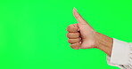 Woman, hands and thumbs up on green screen for good job or success against a studio background. Hand of female person with thumb emoji, yes sign or like for agreement, approval or well done on mockup