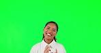 Happy woman, pointing up and applause in success on green screen for winning against a studio background. Portrait of excited female person point and clapping in celebration for congratulations