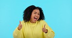 Face, excited woman and thumbs up for success, support or winning in studio isolated on a blue background mockup. Portrait, like hand gesture and African person with emoji for happy, yes or thank you