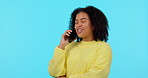 Happy, phone call and smile with woman on studio for communication, contact and networking. Technology, happiness and conversation with female person on blue background for discussion and mobile