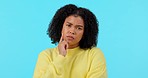 African woman, thinking face and studio with ideas, mindset and focus with curly hair by blue background. Young student girl, confused or doubt for choice, decision and brainstorming in portrait