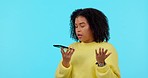 Frustrated, phone call and woman angry, speaker and communication on a studio background. Female person, girl and model with a smartphone,  fighting and anger with stress and conflict with contact