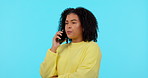 Happy, phone call and laugh with woman on studio for communication, contact and networking. Technology, happiness and conversation with female person on blue background for discussion and mobile