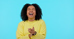 Woman cheers, support and applause for celebration, face and excited to win on blue background. Happiness, energy and female person laughing, clap for achievement, yes and fist pump with mockup space