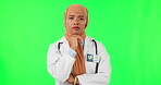 Thinking, green screen woman and Muslim doctor planning ideas, healthcare plan or brainstorming medical solution. Chroma key portrait, serious decision and Islam female surgeon on studio background
