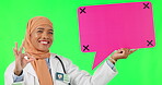 Muslim woman, doctor and okay sign with speech bubble on green screen in success against a studio background. Portrait of female healthcare expert pointing to icon, like emoji or OK social media chat