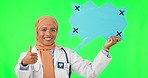 Muslim woman, doctor and thumbs up with speech bubble on green screen for success against a studio background. Portrait of female healthcare expert pointing to icon, like emoji or social media chat