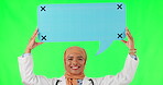 Muslim woman, doctor and speech bubble on green screen for chat against a studio background. Portrait of female medical person in healthcare with social media icon or shape for voice on mockup space