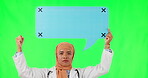 Muslim woman, doctor and speech bubble on green screen in protest against a studio background. Portrait of female person, medical or healthcare and social media icon for chat or voice on mockup space