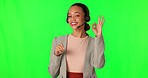 Green screen call center, woman face or okay comparison for good decision choice, customer service or telemarketing. Chroma key portrait, ok communication and person shake finger on studio background