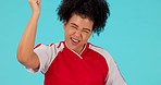 Soccer, face and woman clapping hands, cheering and celebration in studio with good news, score or results on blue background. Football, portrait and happy lady winner with sports applause or success