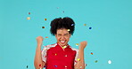 Celebration confetti, success and woman excited for studio bonus, winning reward or prize giveaway. Competition winner, achievement and portrait person shout, celebrate or cheers on blue background