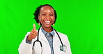 Happy doctor, thumbs up and black woman on a green screen for support, thank you and medicine. Portrait, success and African surgeon with a gesture for healthcare isolated on mockup studio background