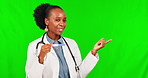 Healthcare, doctor pointing and pregnancy test against a green screen for direction with hand gesture. Pregnant results or news, mockup space and woman surgeon explain steps for medical presentation