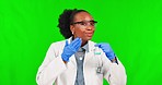 Chemical, woman and scientist in a studio with green screen smelling a liquid in a glass beaker. Thumbs up, science and portrait of African female chemist with a no gesture by chroma key background.