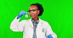 Science, green screen and black woman with chemistry, test and liquid in glass beaker for research on studio background. Happy, scientist or student in experiment, solution and safety in laboratory